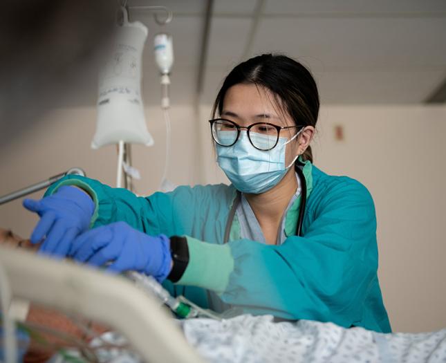 A student performs care while completing a Covenant Health student placement.