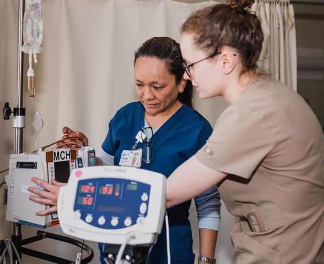 Job shadows A Covenant Health staff member and student work together.